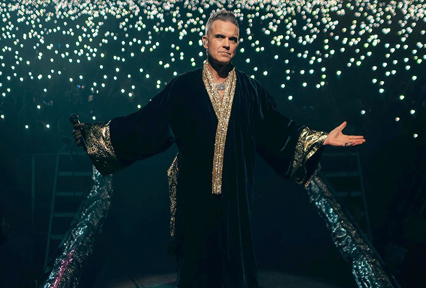 Robbie Williams detiene concierto por falta de aire y culpa al Covid